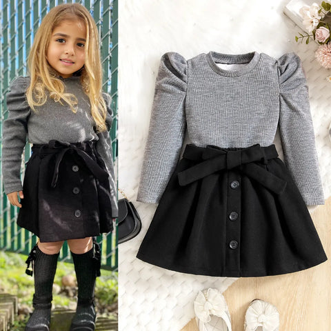 Classic Puff Shoulder Top & Bow Belt Skirt Set – Monochrome Edition (1-5 Years) Classic Puff Shoulder Top & Bow Belt Skirt Set – Monochrome Edition (1-5 Years)