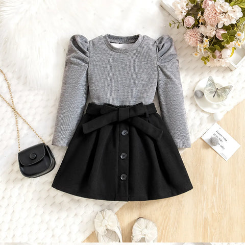 Classic Puff Shoulder Top & Bow Belt Skirt Set – Monochrome Edition (1-5 Years) Classic Puff Shoulder Top & Bow Belt Skirt Set – Monochrome Edition (1-5 Years)