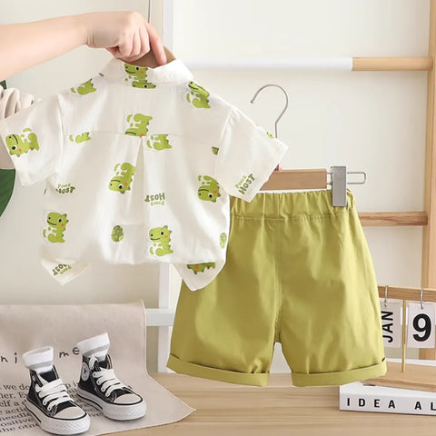 Mini Dino Adventure Set – Printed Shirt & Shorts with Tie (1-5 Years) Mini Dino Adventure Set – Printed Shirt & Shorts with Tie (1-5 Years)