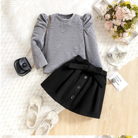 Classic Puff Shoulder Top & Bow Belt Skirt Set – Monochrome Edition (1-5 Years) Classic Puff Shoulder Top & Bow Belt Skirt Set – Monochrome Edition (1-5 Years)