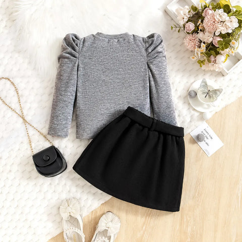 Classic Puff Shoulder Top & Bow Belt Skirt Set – Monochrome Edition (1-5 Years) Classic Puff Shoulder Top & Bow Belt Skirt Set – Monochrome Edition (1-5 Years)